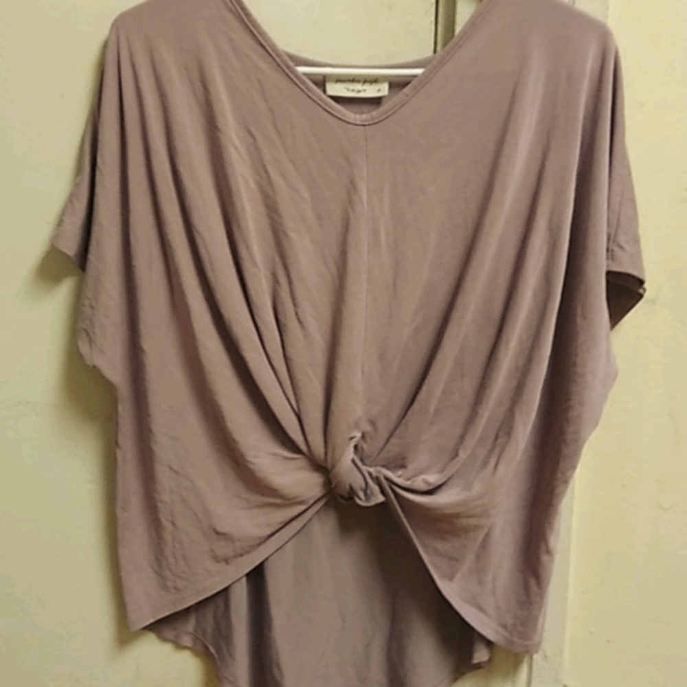 Knotted cropped front, long back blouse